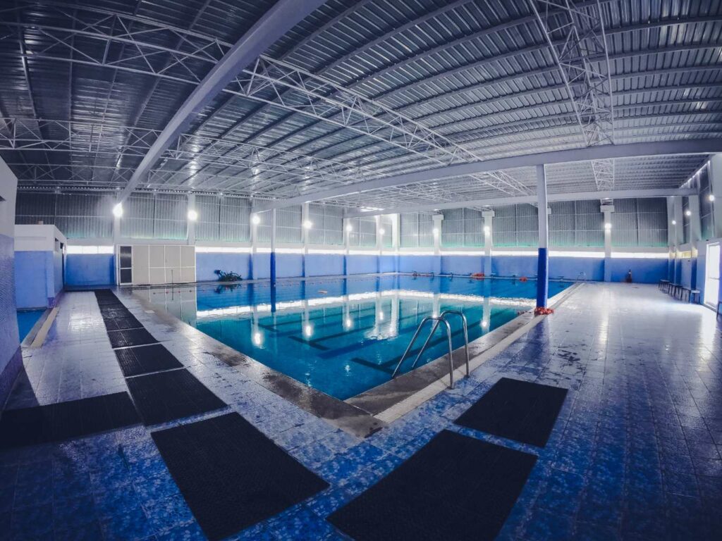 light blue olympic indoor swimming pool